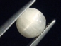 Preview: Beryllonite cat's eye 0,93 Ct. rare round cabochon Linopolis, Brazil