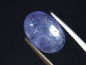 Preview: Tansanit 4,472 Ct. violett 12 x 9 mm Oval Cabochon