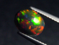 Preview: Schwarzer Opal 1,47 Ct. behandelt - 9 x 7 mm Oval Cabochon