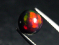 Preview: Black Opal 1,39 Ct. treated - round cabochon