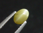 Preview: Chrysoberyl cat's eye 0,91 Ct. cabochon B-quality