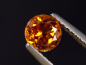 Preview: Spessartit Granat 0,66 Ct. leuchtend orange 5 mm Rund Tansania