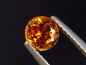 Preview: Spessartit Granat 0,66 Ct. leuchtend orange 5 mm Rund Tansania