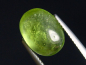 Preview: Peridot 5,72 Ct. - Apfelgrün - 12 x 9 mm Oval Cabochon