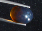 Preview: Blauer Bernstein 3,45 Ct. - 14 mm Oval Cabochon Indonesien