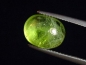 Preview: Peridot 6,51 Ct. applegreen - 12 x 9 mm oval cabochon