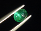 Preview: Emerald cat's eye 0,65 Ct. oval cabochon Colombia