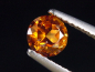 Preview: Spessartit Granat 0,78 Ct. leuchtend orange 5 mm Rund Tansania B-Qualität