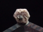Preview: Bixbite / red Beryl with Bixbyite 5 mm crystal - Topaz mountain, Utah, USA