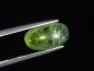 Preview: Peridot cat's eye 4,57 Ct. - apple green - oval cabochon