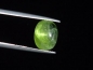 Preview: Peridot cat's eye 7,07 Ct. - apple green - oval cabochon