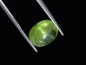 Preview: Peridot cat's eye 7,07 Ct. - apple green - oval cabochon