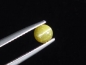 Preview: Chrysoberyl cat's eye 0,68 Ct. round cabochon Sri Lanka