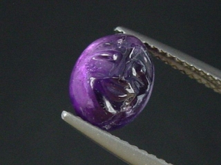 Amethyst intaglio 2,35 Ct. man in moon 9 x 7 mm oval