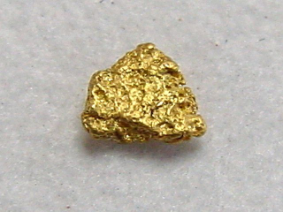 Gold nugget 4 mm - Palsinoja, Lappia, Finland