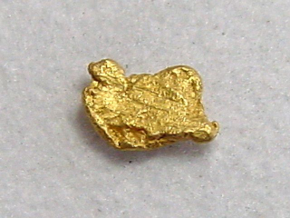 Gold nugget 5 mm - Palsinoja, Lappia, Finland