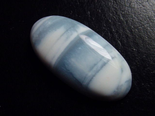 Blue Opal 38,76 Ct. oval cabochon