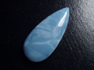 Blue Opal 24,52 Ct. pear cabochon