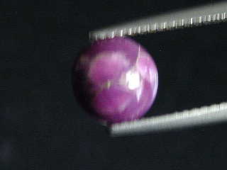 Sugilite 1,64 Ct. round cabochon