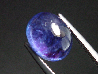 Tansanit 4,89 Ct. Spitzenfarbe 11 x 9 mm Oval Cabochon