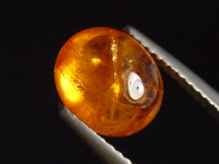 Spessartite Garnet 4,28 Ct. oval cabochon