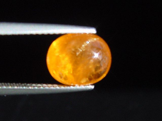 Spessartite Garnet cat's eye 4,64 Ct. oval cabochon Tanzania