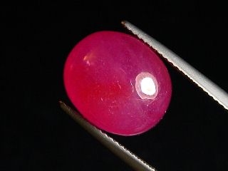 Ruby 17,95 Ct. oval cabochon - pink red - treated