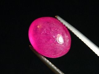 Ruby 8,43 Ct. oval cabochon - pink red - treated