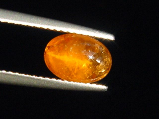 Spessartite Garnet cat's eye 2,43 Ct. oval cabochon Tanzania