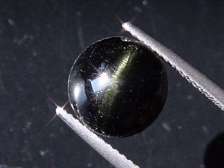 Enstatite Catseye 6,09 Ct. - round cabochon - Sri Lanka