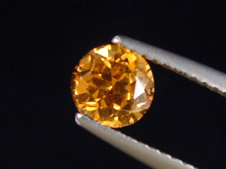 Spessartite Garnet 0,98 Ct. fine orange round Tanzania B-quality