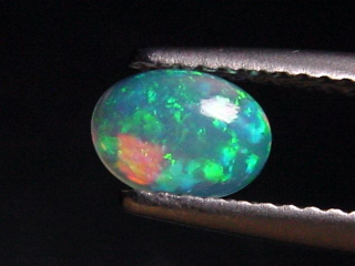 Opal 0,43 Ct. finest quality - oval cabochon