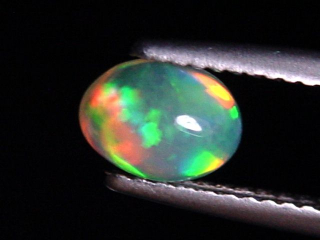 Opal 0,65 Ct. finest quality - oval cabochon