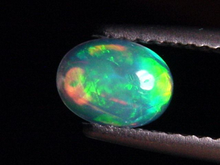 Opal 0,47 Ct. finest quality - oval cabochon