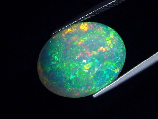 Preview: Opal / Edelopal 11,12 Ct. feinste Qualität - 19 x 15 mm Oval Cabochon Preview: Opal / Edelopal 11,12 Ct. feinste Qualität - 19 x 15 mm Oval Cabochon