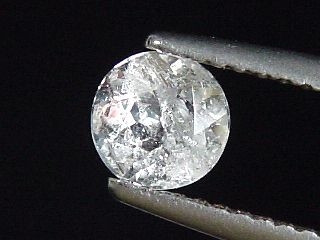 Pollucite 0,59 Ct. round rare - Skardu, Pak.