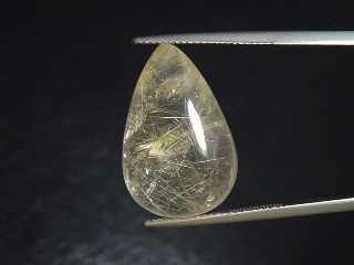 Rutile Quartz 18,70 Ct. golden Rutile needles pear cabochon