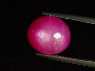 Ruby 11,87 Ct. oval cabochon - rosered - treated