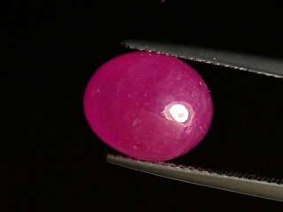 Ruby 9,80 Ct. oval cabochon - rosered - treated