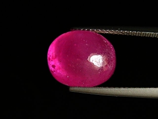 Ruby 12,39 Ct. oval cabochon - rosered - treated