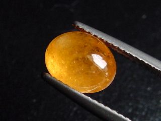 Spessartite Garnet 3,01 Ct. fine color - oval cabochon