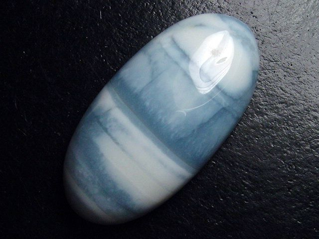 Blue Opal 38,76 Ct. oval cabochon