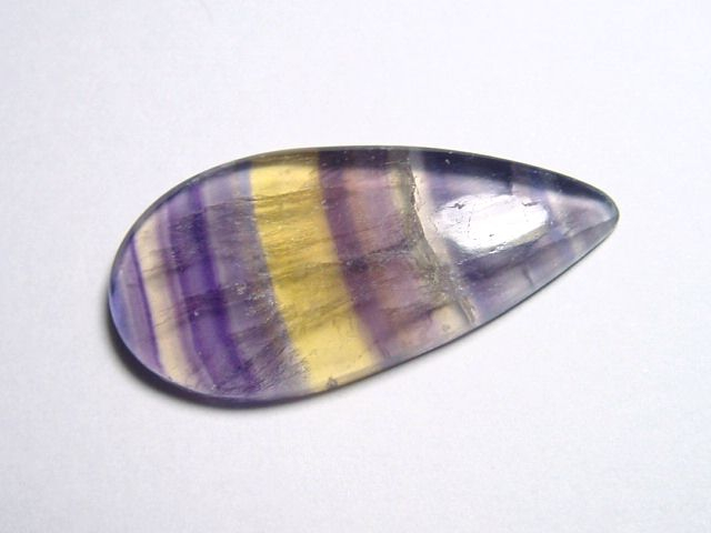 Fluorite 29,86 Ct. multicolor banded cabochon B-quality