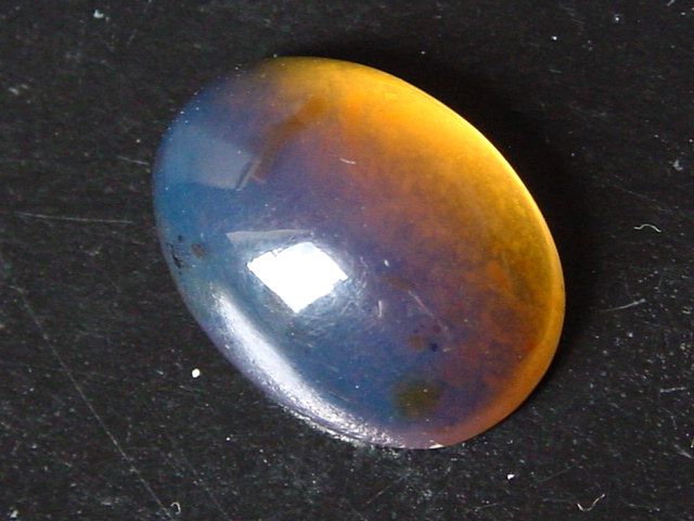 Blue Amber 6,60 Ct. - 20 mm oval cabochon Jambi, Sumatra