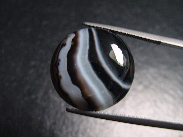 Achat 17,97 Ct. gebändert - Rund Cabochon Brasilien