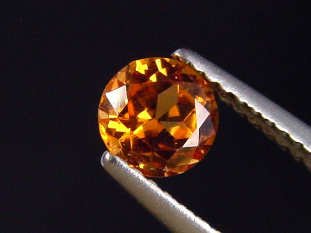 Spessartit Granat 0,79 Ct. leuchtend orange 5,5 mm Rund Tansania