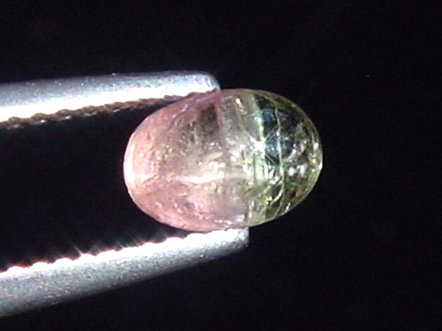 Tourmaline cat's eye 0,95 Ct. oval cabochon Brazil