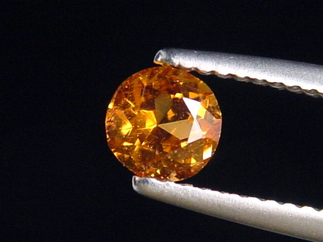 Spessartite Garnet 0,71 Ct. fine orange round Tanzania