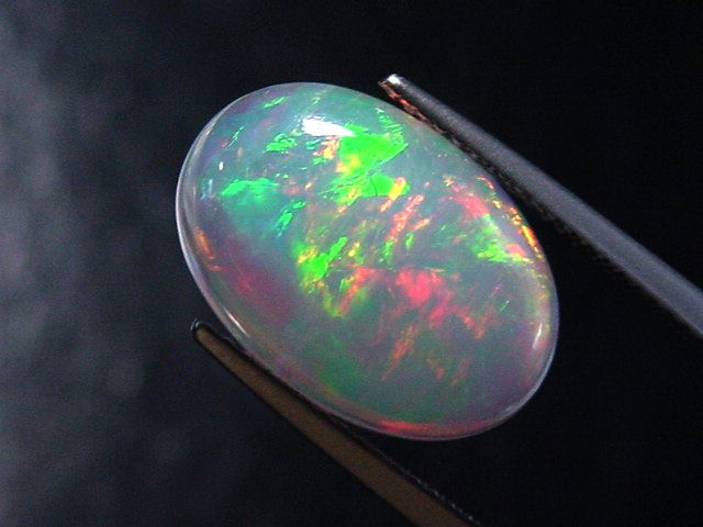 Opal 5,40 Ct. finest quality - oval cabochon