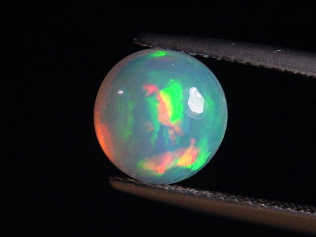 Opal 1,57 Ct. finest quality - round cabochon